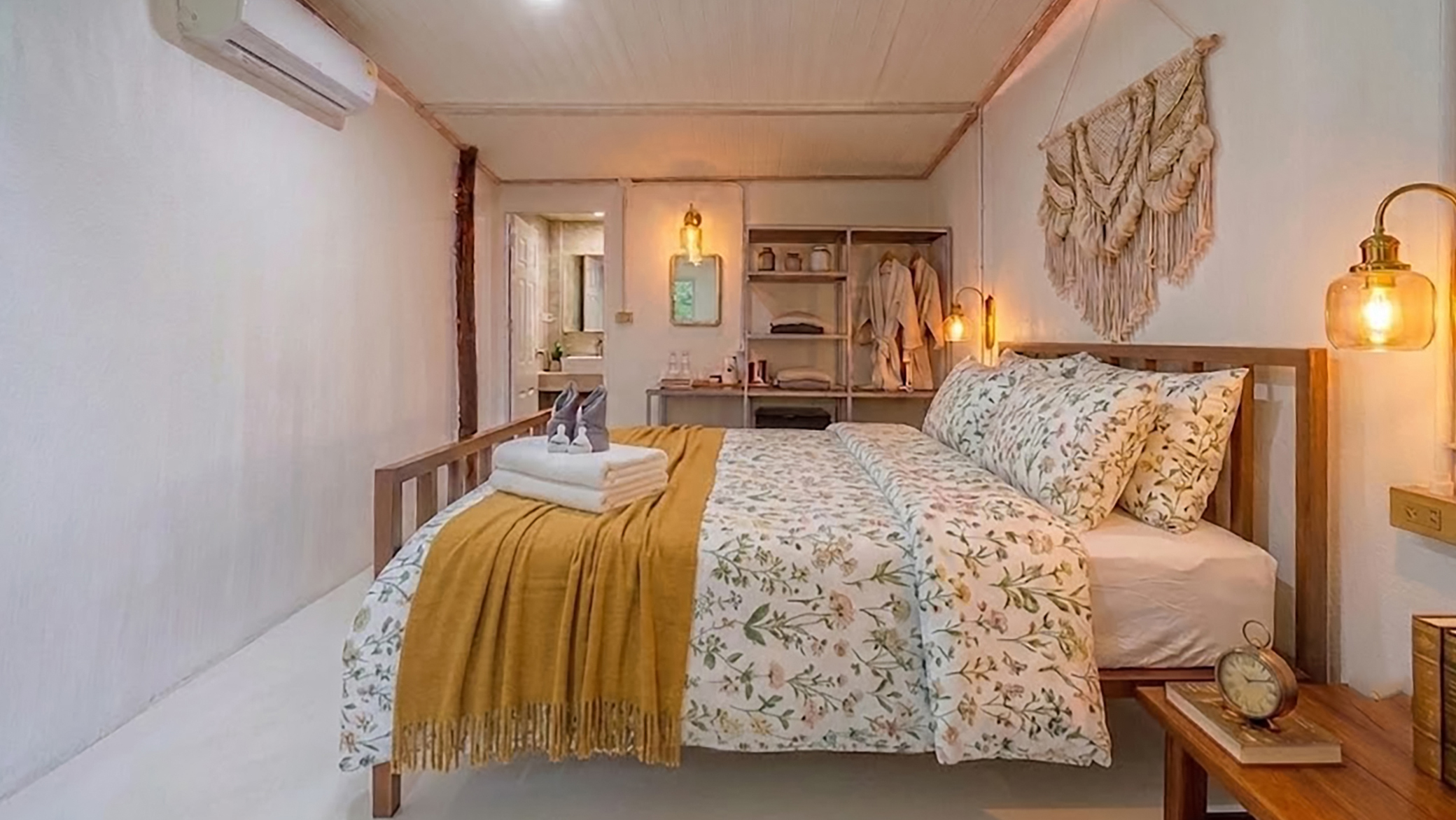 Rustic villa bedroom with king bed at LLe Panpurie Koh lanta Resort & Spa